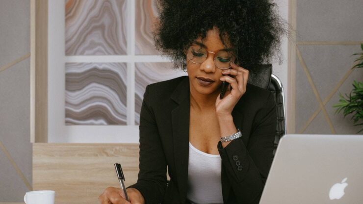 a woman holding a smartphone